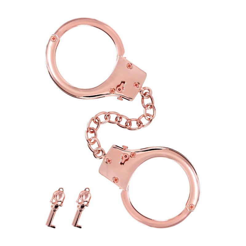 Menottes pour poignets en métal or rose - 1